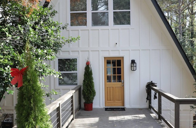 A frame cottage with private dock on lake