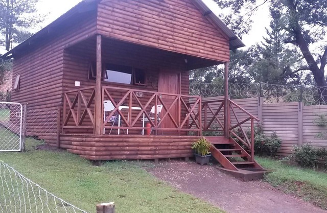 A log style cabin having one major room