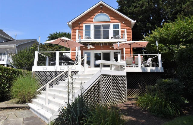 A most envious location! Home includes a beautiful gourmet kitchen with a dining area and a Guest House with Bedroom and Full Bath!