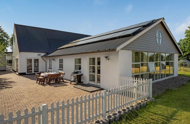 A spacious cottage surrounded by golden fields awaits you.