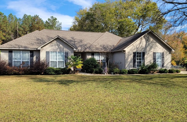 Acreage with pool in town