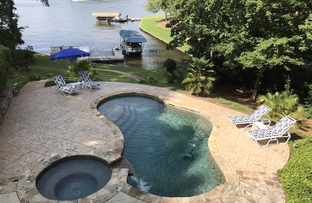 Adorable lakeside oasis on Lake Oconee with private pool and full size dock.