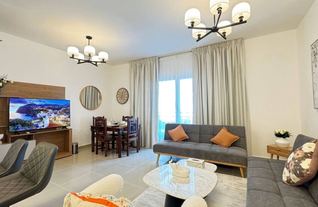 Al Reef Retreat: Your 1BR w/Sofa Beds, Pool & Gym