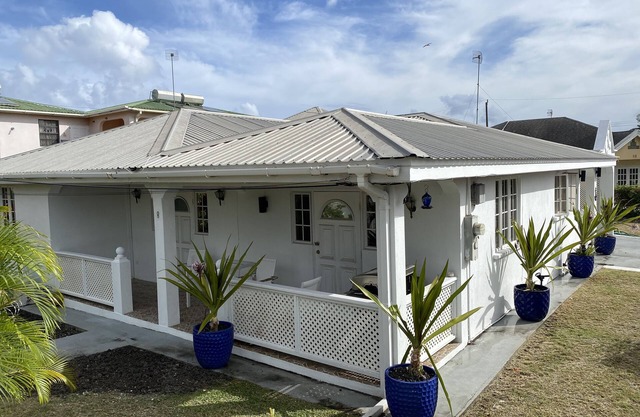Anchor Villa , 4 bedroom single family home nSteps to the beach .