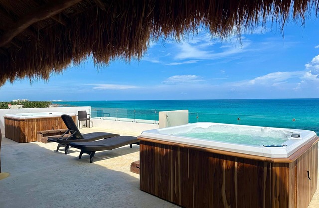 Angelina 28 Beachfront and Family Apartments - Modern and Relaxing Long Stays (20 min from Cancun Airport)