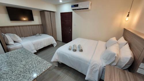 Apartaestudio 21 Detrás del Hyper Jumbo con planta eléctrica