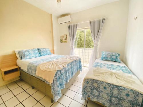 Apartamento amplo perto da Praia da Litorânea - Carmona Temporadas