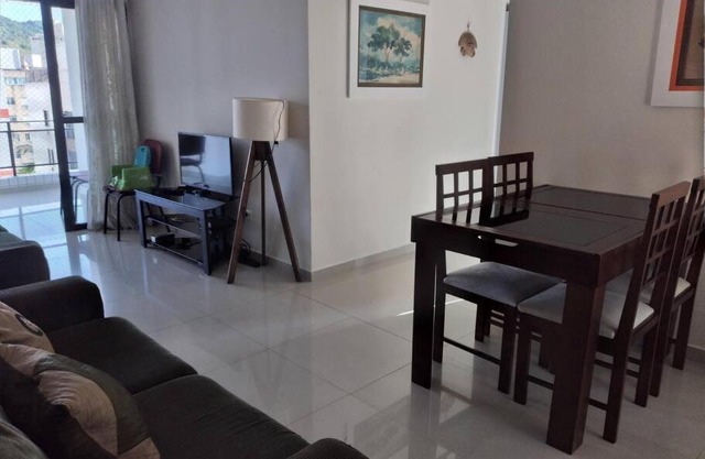 Apartamento com churrasqueira e próximo à praia