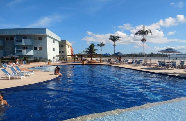 Apartment in Golden Lake residence - with foot in the sand, coconut water and beer
