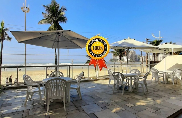 Apartment in Guarujá, facing the sea, beach service, Wi-Fi, air conditioning, garage