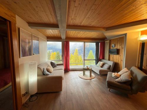 Appartamento panoramico con vista sulle montagne e accesso diretto alle piste