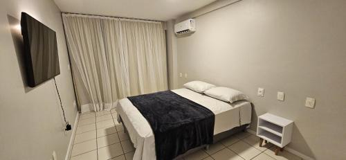 Apto 2 Quartos com Suíte, Garagem, 300m da Praia