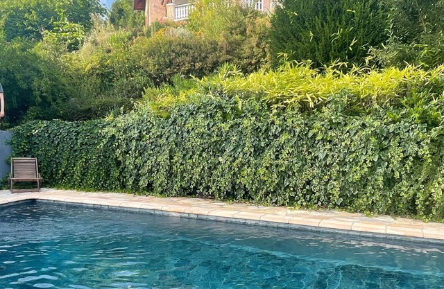 ARCHITECT DESIGNED HOME WITH STUNNING PANORAMIC VIEW AND SWIMMING POOL