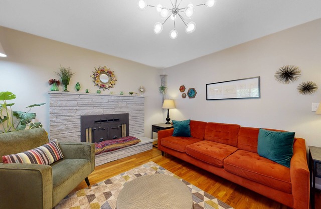 Artsy retreat with a large yard, playground, covered patio