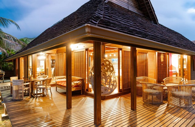 Balinese style wooden house just steps from the beach