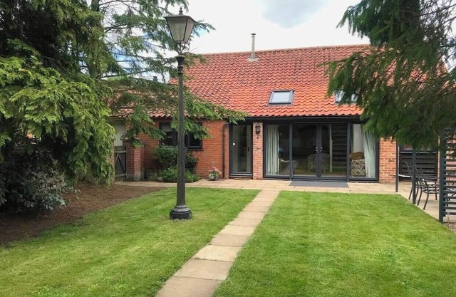 Barn with countryside views in private garden