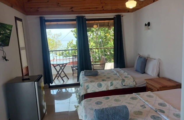 Beach Front 1-bedroom apartment with WiFi, AC in fantastic Punta Rucia
