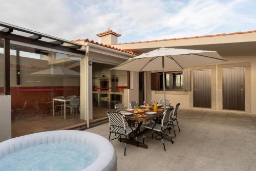 Beach Villa with Jacuzzi & Garage by HostWise