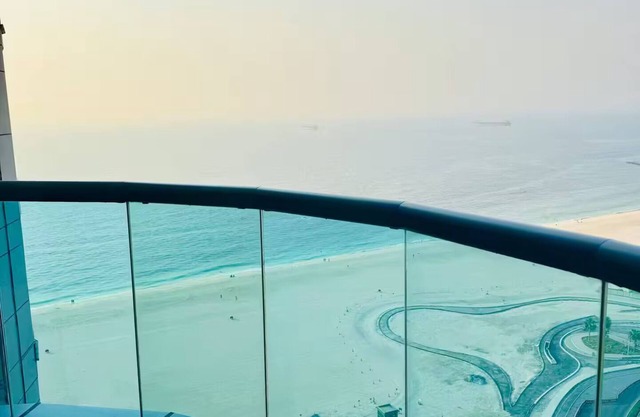 Beachfront 2BR Apartment with Stunning Sea View