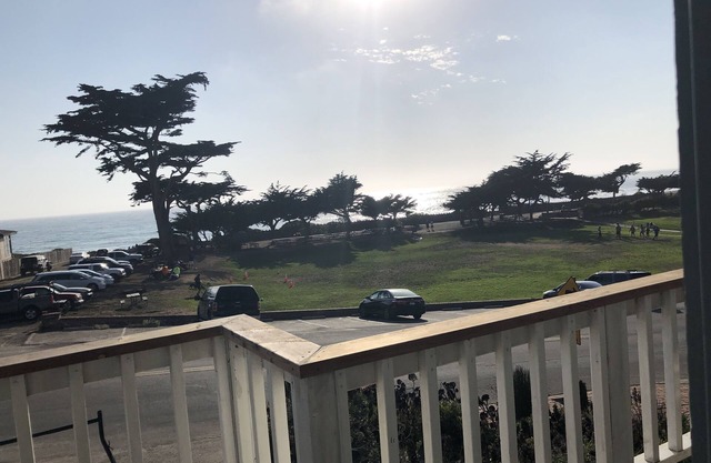 Beachfront home directly across from beach & park! Close to everything!