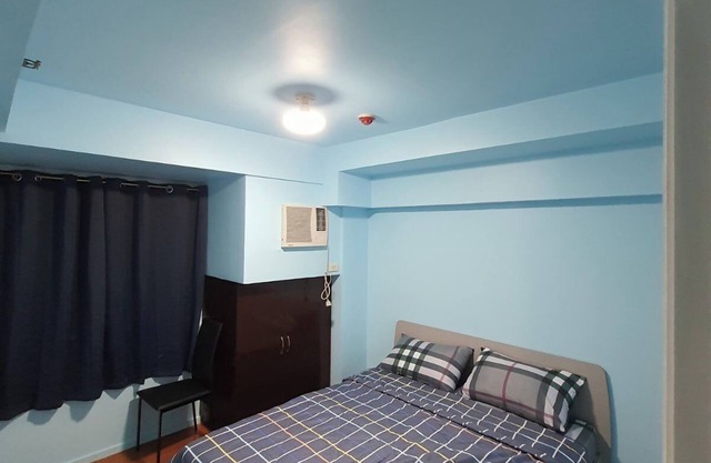 Beautiful 2-bedroom condo in nice Mandaluyong with WiFi, AC, fitness room