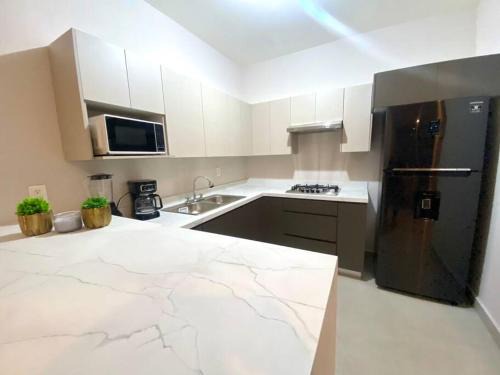 Beautiful apartment, BBQ, A.C, 5 min Arena, Gym