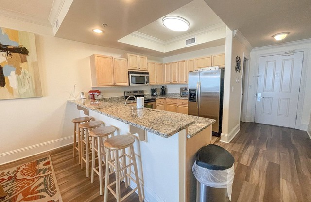 Beautiful Gulf Front Condo with well-stocked kitchen and well-appointed balcony.