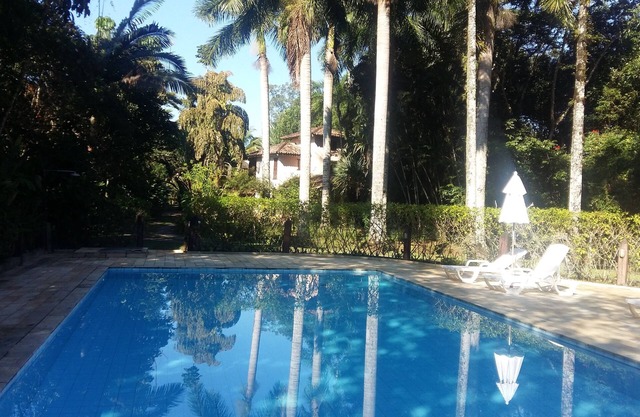 Beautiful house in gated community with large recreation area, tennis court.