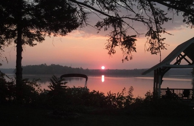 Beautiful lake-home, plus separate cottage, 200+ feet level shoreline,1.3 acres