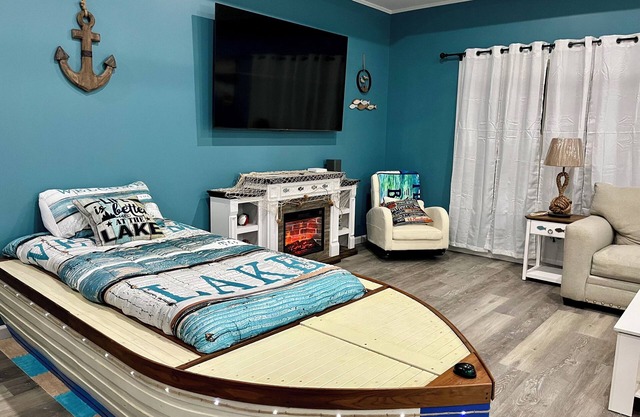 Beautiful new construction lake themed lake house with gameroom and boat bar.