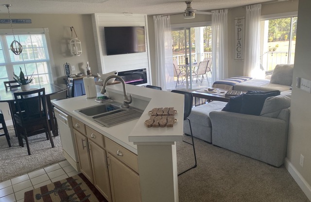 Beautiful Second Floor 2-Bedroom Two-Bath Condo With Water and Golf Views