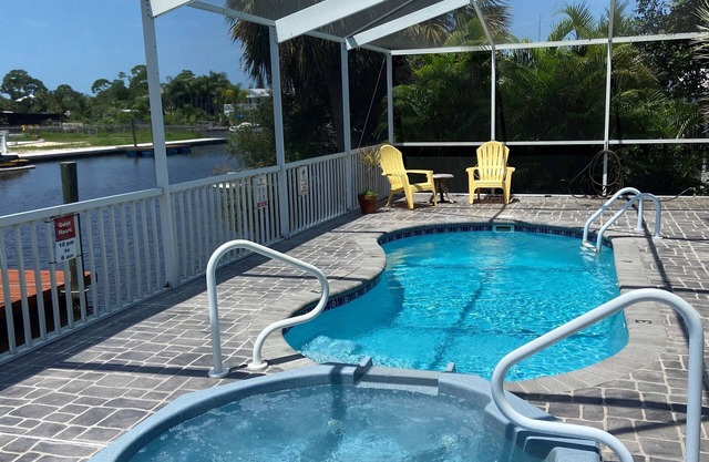 Beautiful view, heated Pool/Spa and private dock with direct Gulf access