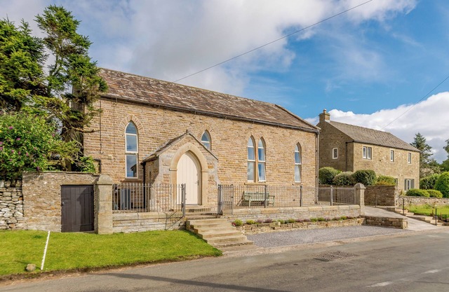 Behind the beautiful arched door way is the luxurious interior of Church Manor.