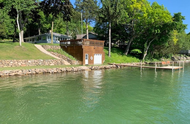 Big Cedar Lake, 125 feet of sandy frontage, beautiful shore, sunsets, spacious