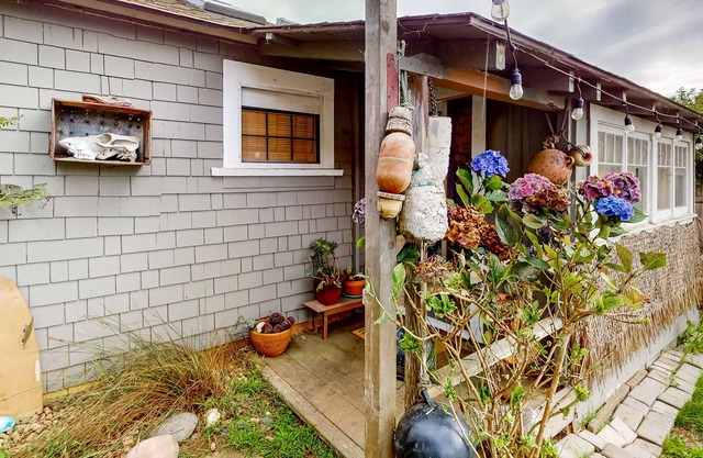 Bohemian water view retreat with well-stocked kitchenette, internet, & patio