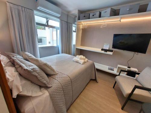 Book Santos - M.A. Frente à praia do José Menino