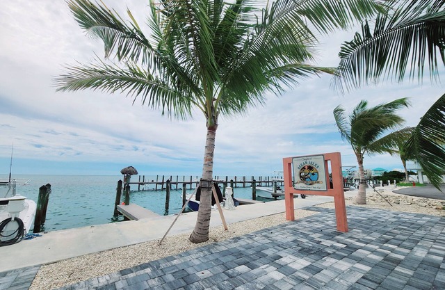 Brand new 1 bedroom, 2 bath condo with waterfront pool & stunning views.