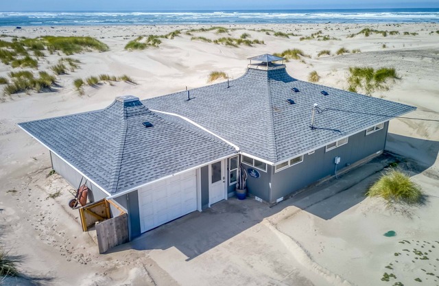 Bright, Open, Updated Single-Level Oceanfront Home Right on Beach with Game Room