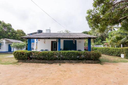 Cabaña con aire, camarote, hamaca, TV cerca al mar