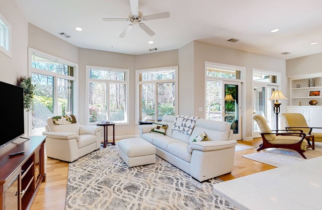 Calm home with patio, enclosed yard, tennis court, golf courses, & heated pool