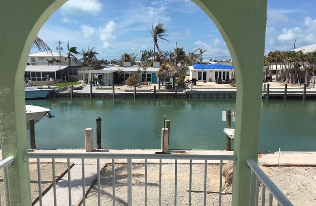 Canal side location with beach & pool club membership!