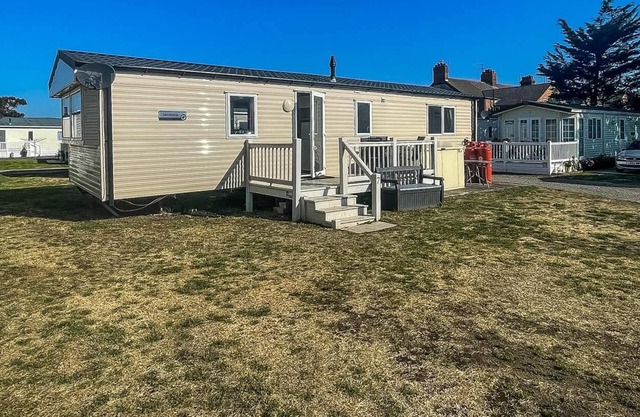 Caravan at Suffolk Sands Holiday Park with decking and WiFi ref 45023A