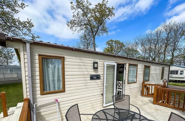 Caravan with decking at Carlton Meres Park in Suffolk ref 60059M