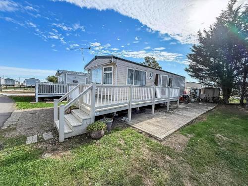 Caravan With Decking & Free Wifi At Steeple Bay Ref 36051D
