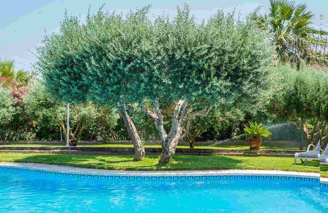 Cas Home, with tennis court