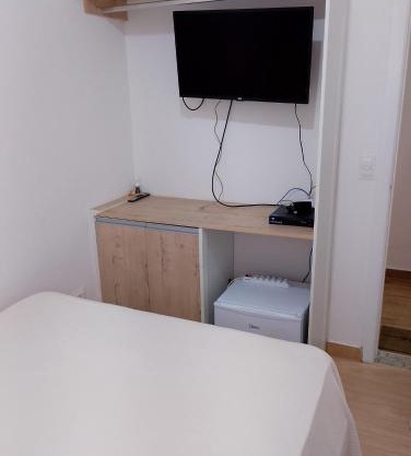 casa a uma quadra da praia