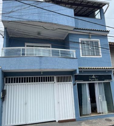 Casa azul alto padrão