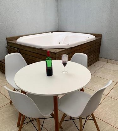 Casa com Jacuzzi e churrasqueira individual