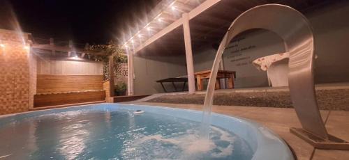 Casa com Piscina e Área Gourmet 3 Quartos na Praia