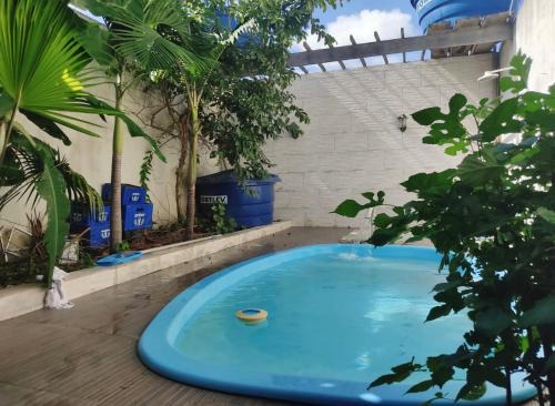 Casa com piscina e ar condicionado